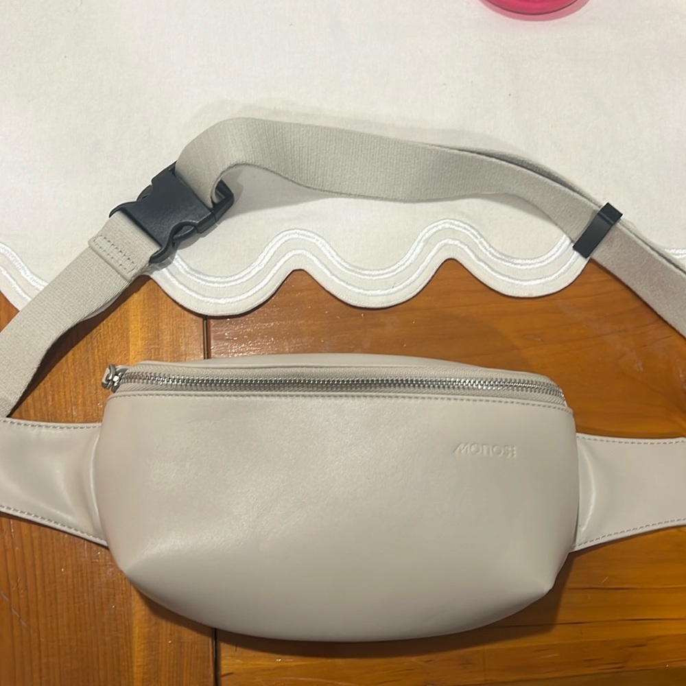 Monos metro sling bag in ivory vegan leather